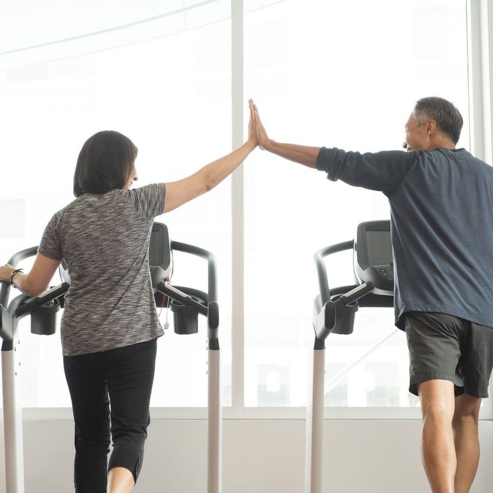 mature couple treadmill high5 David Jakle Image Source GettyImages 592013363 569bb3525f9b58eba4a51c7f