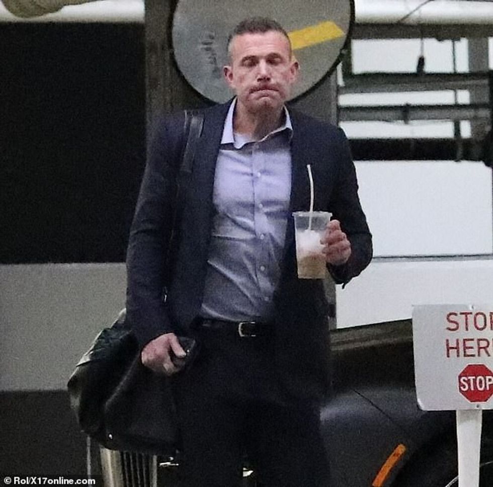 Meanwhile Ben stepped out without his wedding ring on Monday as he arrived at his LA office