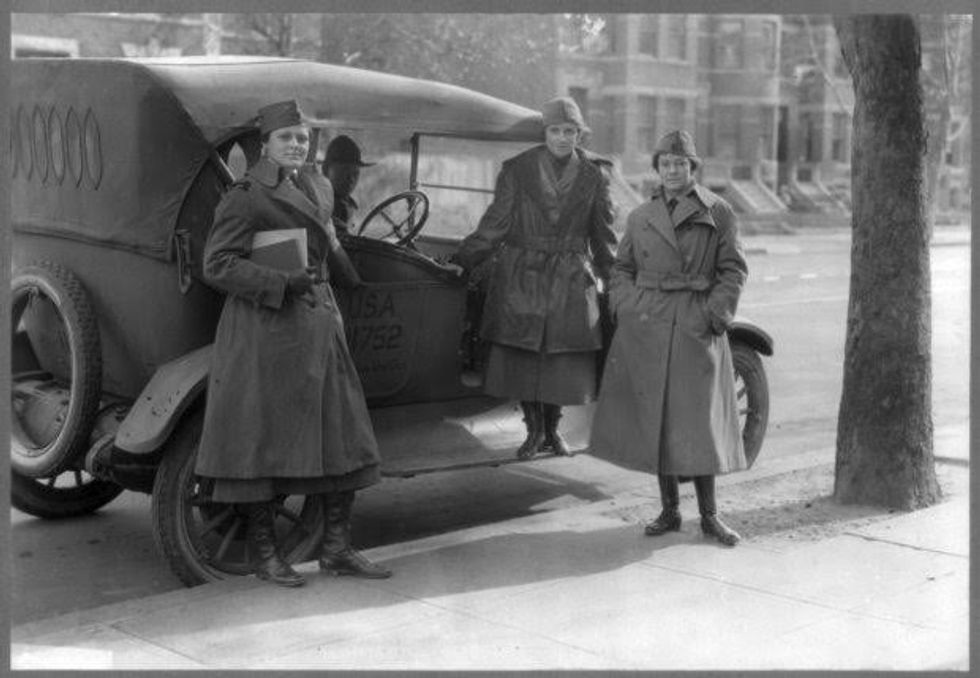 Members of The Women's Radio Corps stand beside an army car, circa February 1919, in this Library of Congress handout photo. For women 100 years ago, opportunities to work beyond the home and take part in political life were very limited. As the 20th century progressed, hard-won progress included gradually improved voting rights, while the upheaval of war pushed doors ajar as women worked as part of the war effort. U.S. Library of Congress archive photos show women's workplaces ranging from a flour mill in England to a coal mine in Belgium or Lincoln Motor Co.'s welding department in Detroit. International Women's Day is celebrated on March 8. REUTERS/Library of Congress/Handout via Reuters SEARCH
