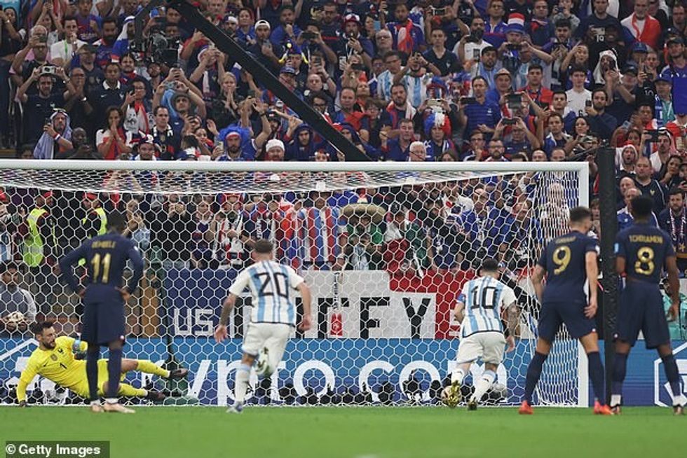 Messi (10) sends France goalkeeper Hugo Lloris the wrong way from the penalty spot