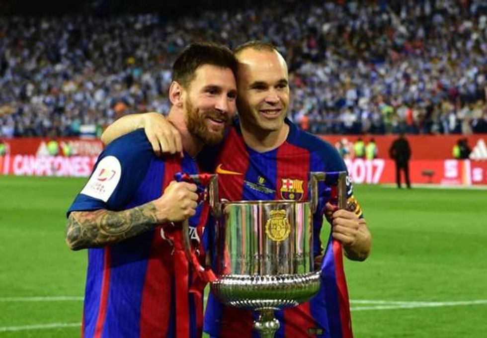 messi iniesta
