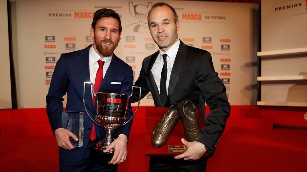 messi iniesta