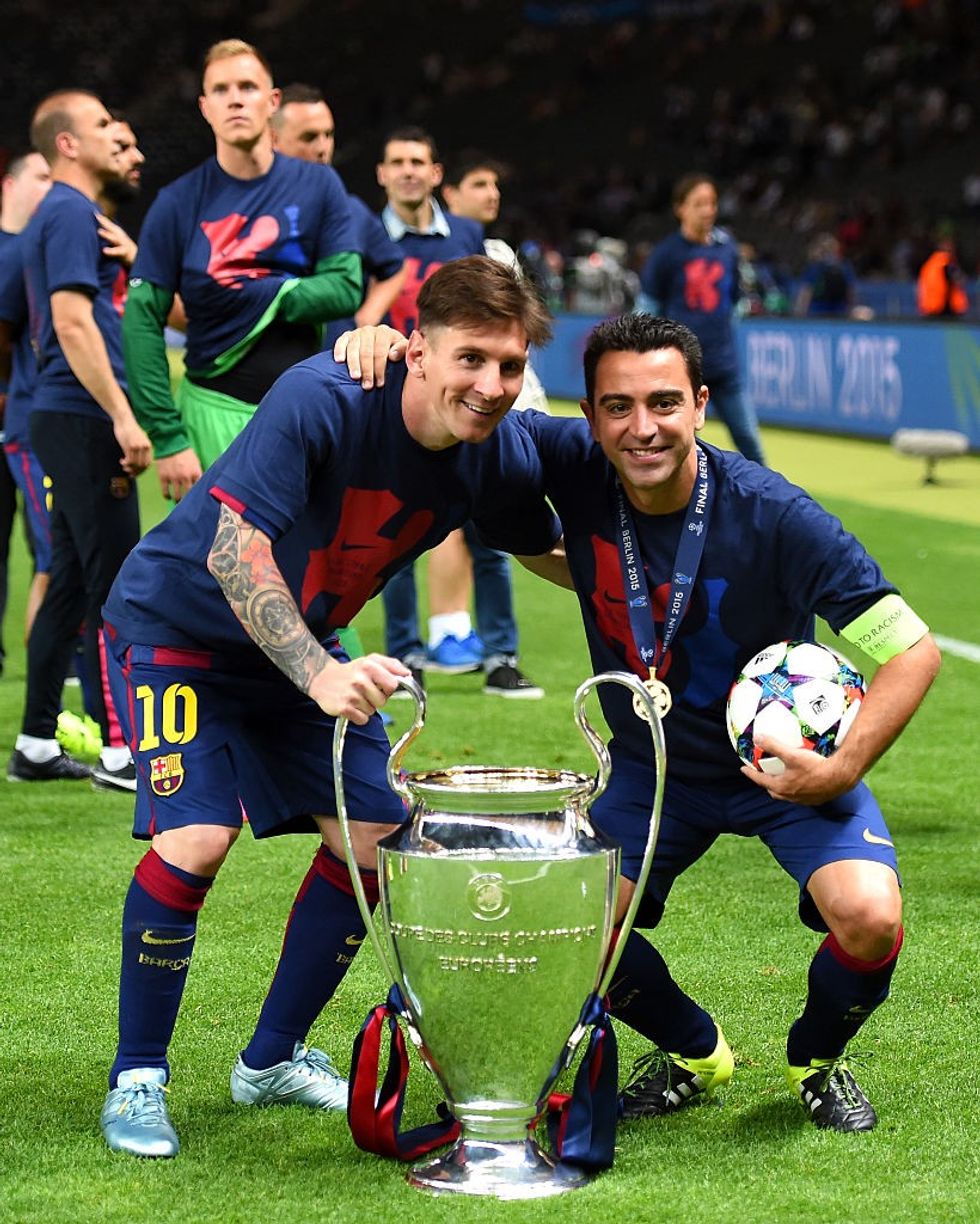 Messi Xavi 1