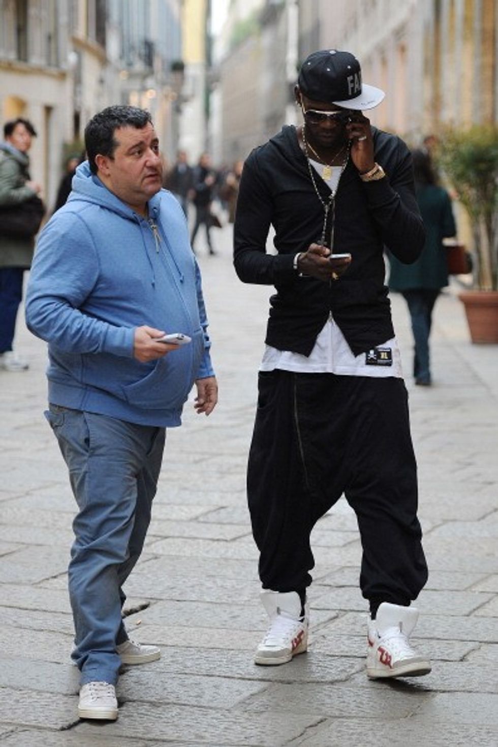 MILAN, ITALY - MARCH 05: Agent Mino Raiola and Mario balotelli are seen on March 5, 2013 in Milan, Italy. (Photo by Jacopo Raule/Getty Images)