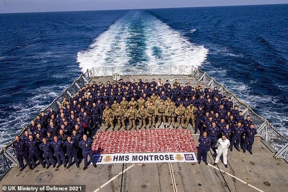 Montrose has staged five successful drugs busts in 2022, the most in the ship's three-year history in the Gulf. Pictured is the ship's crew with one of their hauls
