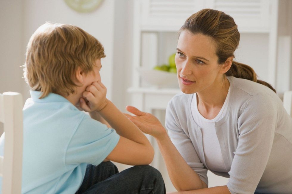 Mother talking to son