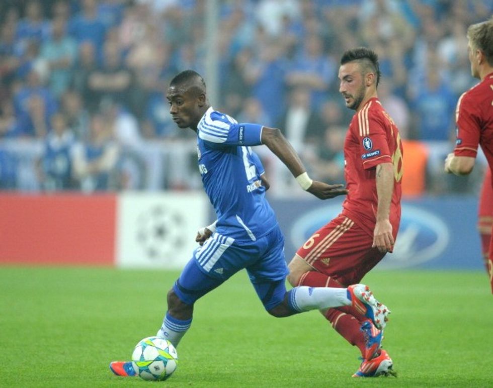 MUNICH, GERMANY - MAY 19: Salomon Kalou of Chelsea with Diego Contento (right) of Bayern Munich during the UEFA Champions League Final between FC Bayern Munich and Chelsea at the Fussball Arena Munich on May 19, 2012 in Munich, Germany. The match ended 1-1 after extra time, Chelsea won 4-3 on penalties. (Photo by Bob Thomas/Getty Images)