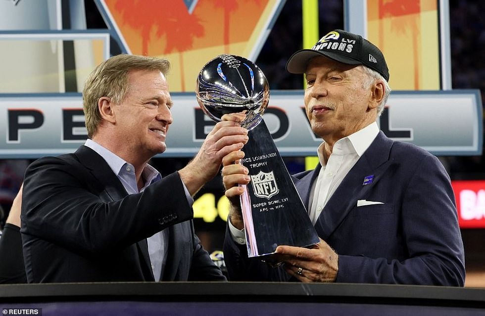 NFL Commissioner Roger Goodell gives the Vince Lombardi Trophy to Rams owner Stan Kroenke in the $5m arena he funded
