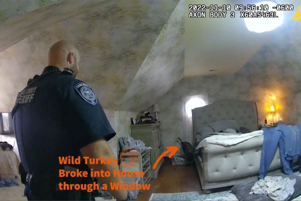 Officers walk into the room.