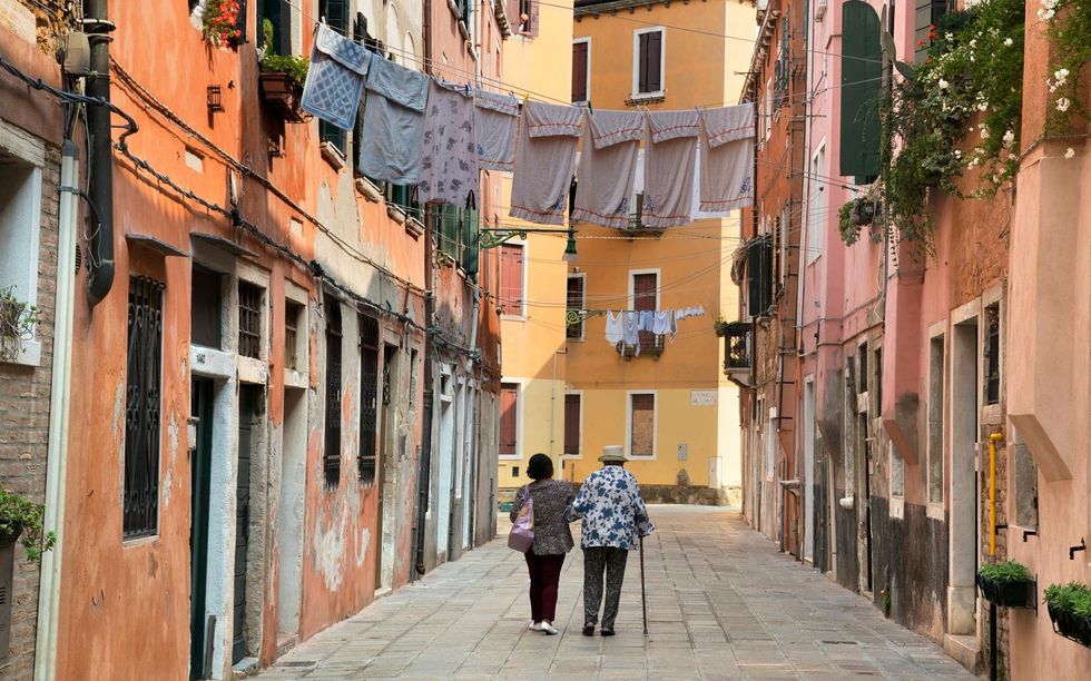 older people walking italy GRANDCIT0919