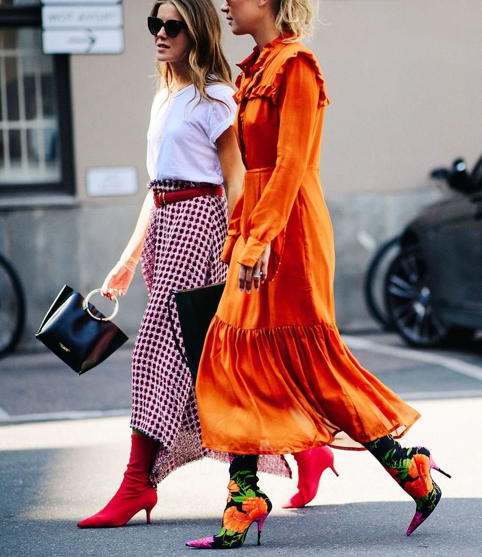 oslo street style red boots sock boots asymmetrical skirt orange dress nina sandbech line langmo