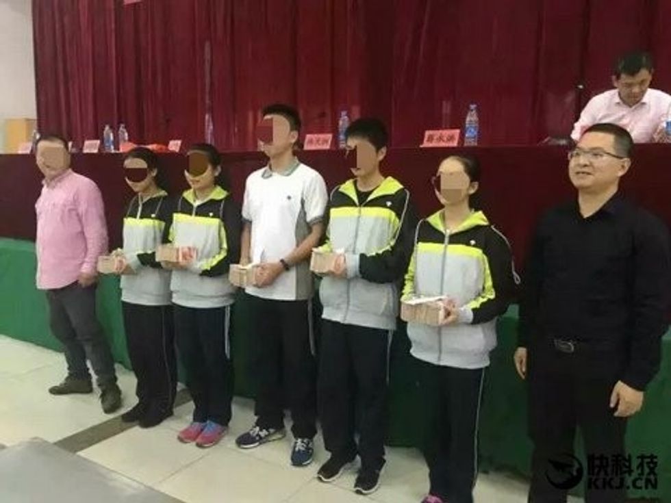 Outrage after a Chinese school awards its top pupils with wads of cash