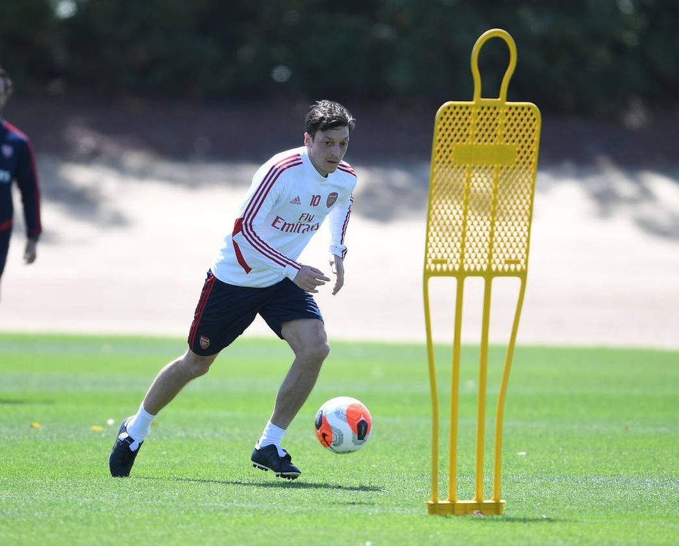 ozil training