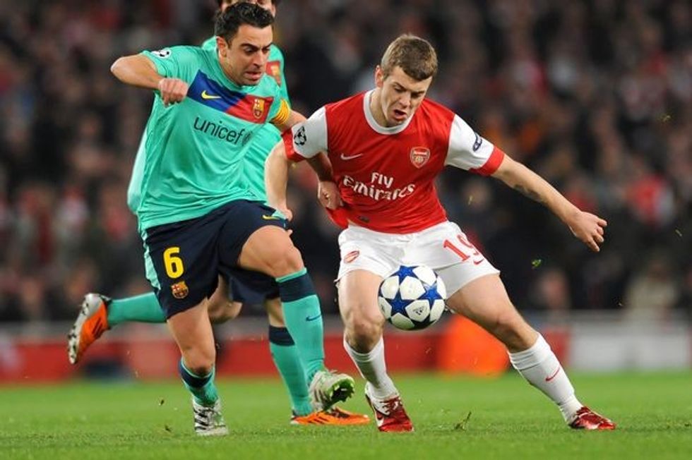 PAY wilshere xavi