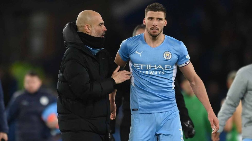 Pep Guardiola and Ruben Dias compress42