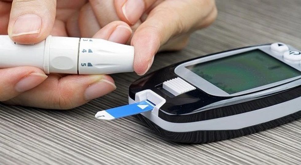 Photo of a person pricking their