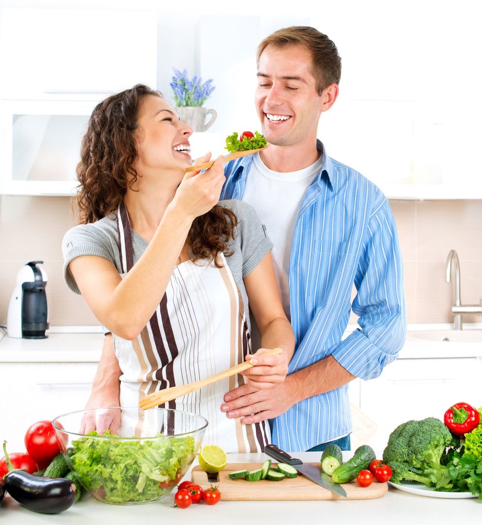 photodune 4046966 happy couple cooking together dieting healthy food l