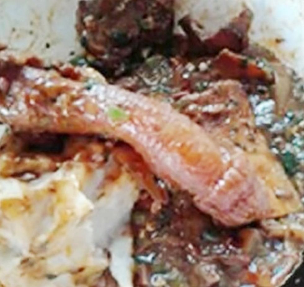 Pic shows: The served meat with the appearance of a male genital organ.nnAstonishing images of what looks like a human penis served up at a fast food bar have become a social media mystery.nnThe manhood-like dish had been unwittingly bought from a traditional chop house in Accra, Ghana by a customer named only as Akosua in local media.nnBut it was only when she got it home and started eating the dish - a local delicacy called Tuo Zafi ¿ that she realised she had bitten off more than she could chew.nnAkousa told local media: