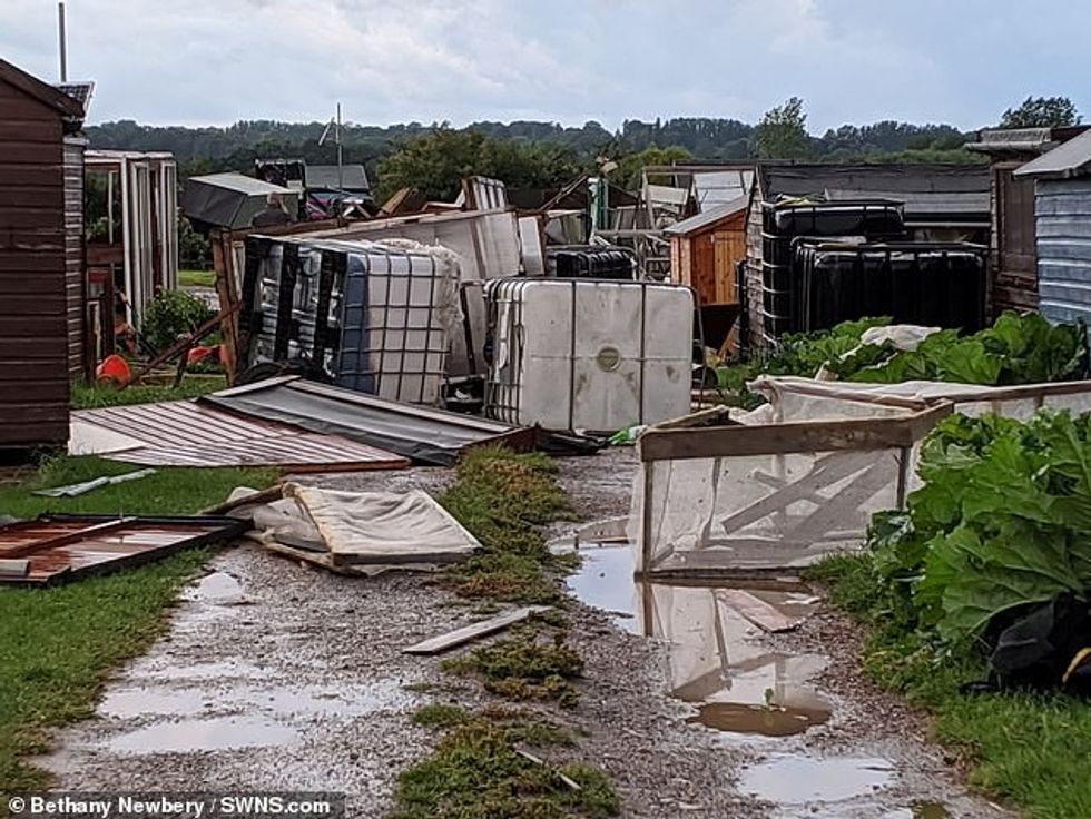Pictured is the destruction of Moulton Allotments in Northampton after a tornado ripped through the area yesterday evening