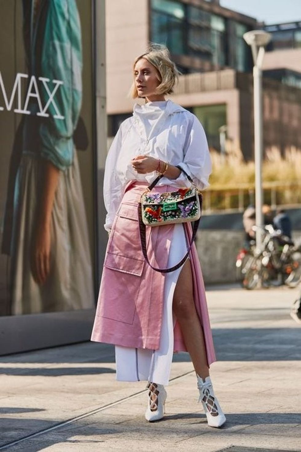 pink light midi skirt white jacket bomber windbreaker white shoe pumps layered blonde bob spring summer lunch