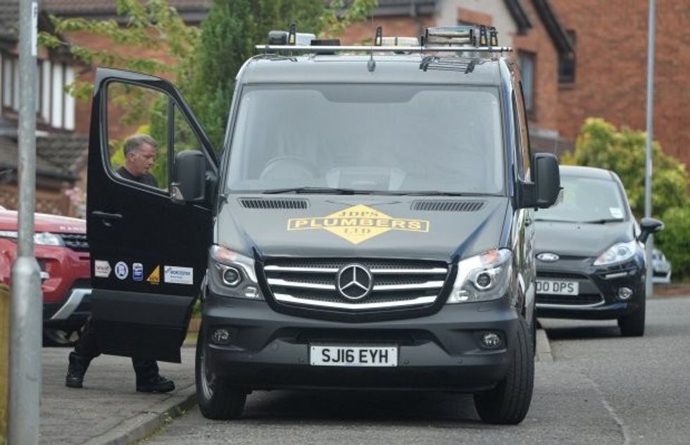 Plumber John Doherty, 52, from Elderslie, Renfrewshire, heads to work despite winning £14m on the National Lottery. July 21, 2016. See Centre Press story CPLOTTO; A plumber who won £14million on the lottery was yesterday (THURS) back at work fixing toilets - just two days after getting his whopping cheque. Grafter John Doherty, 52, said he didn't want to let down his loyal customers - and would be bored sat at home. Dad-of-two John scooped £14,671,343 with wife Alison, 50. The beaming couple were unveiled on Tuesday as the latest lotto jackpot winners. But shortly after 9am yesterday, John was back in his black overalls and jumping into his black Mercedes van - to service a boiler he'd fitted.