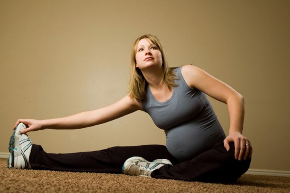 pregnant woman stretching