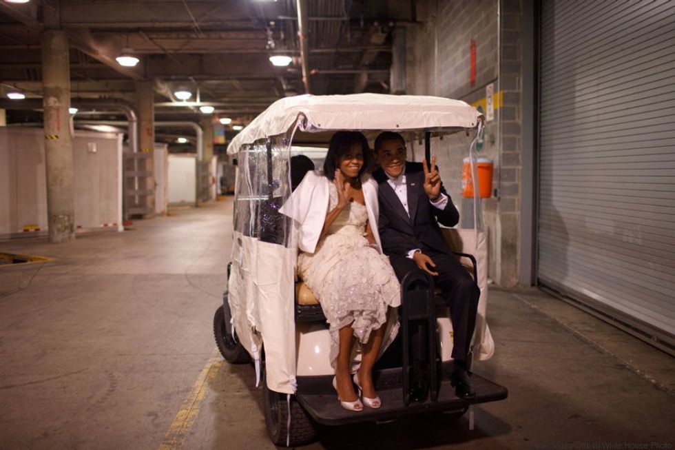 President Barack Obama and First Lady Michelle Obama ride in a golf cart an Inaugural ball 1/20/09 Official White House Photo by Pete Souza