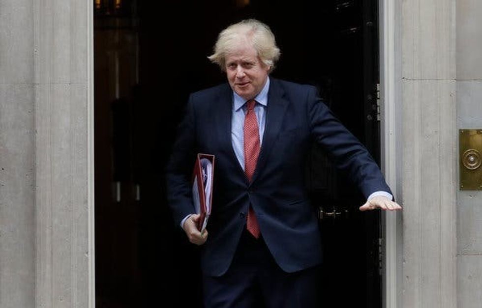 Prime Minister Boris Johnson said it was “absurd and shameful” for a statue of Churchill to be covered as a precautionary measure.