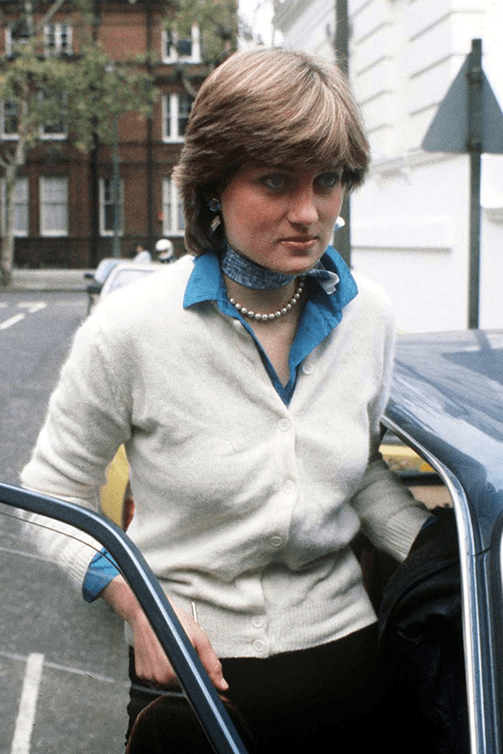 princess diana fashion before royalty cream cardigan and black trousers 1610123796