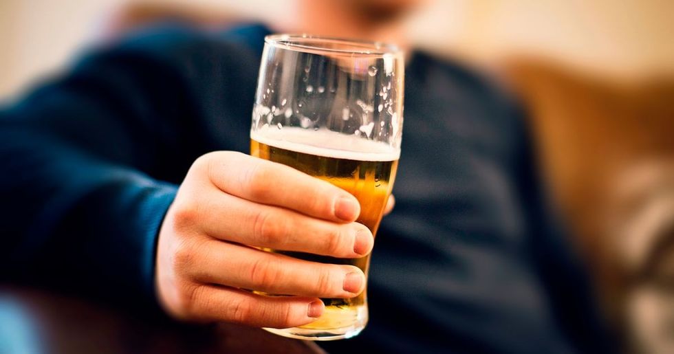 PROD Man drinking pint of beer