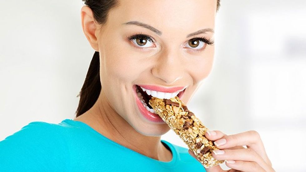Protein Bar woman eating