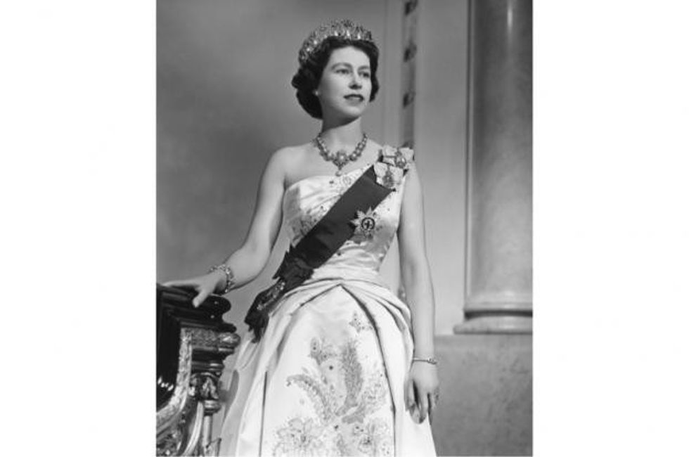 Queen Elizabeth II poses for a portrait at home in Buckingham Palace in December 1958 in London