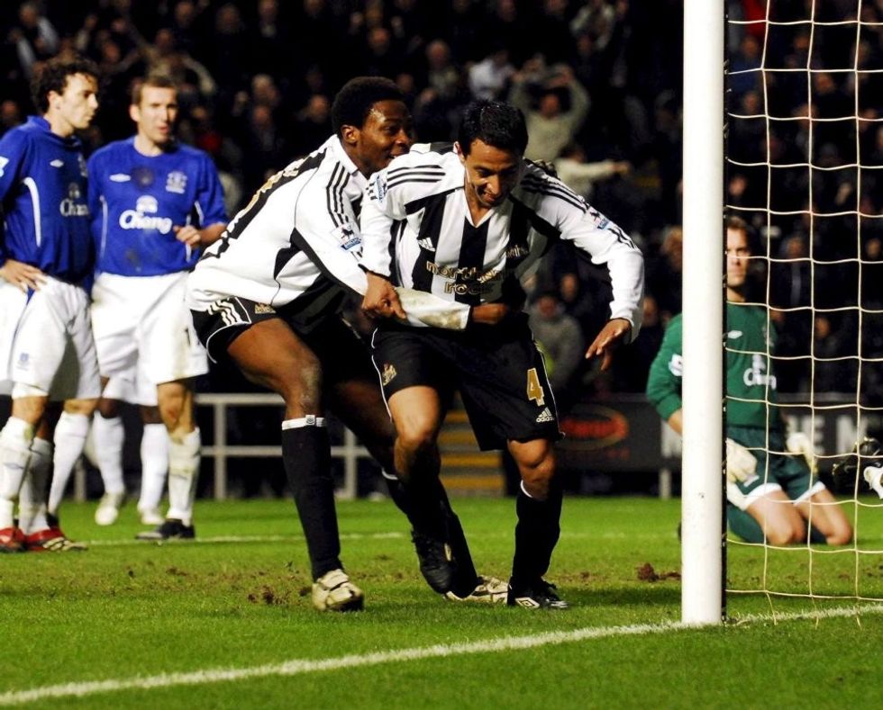 r celebrates team mate shola 3894225