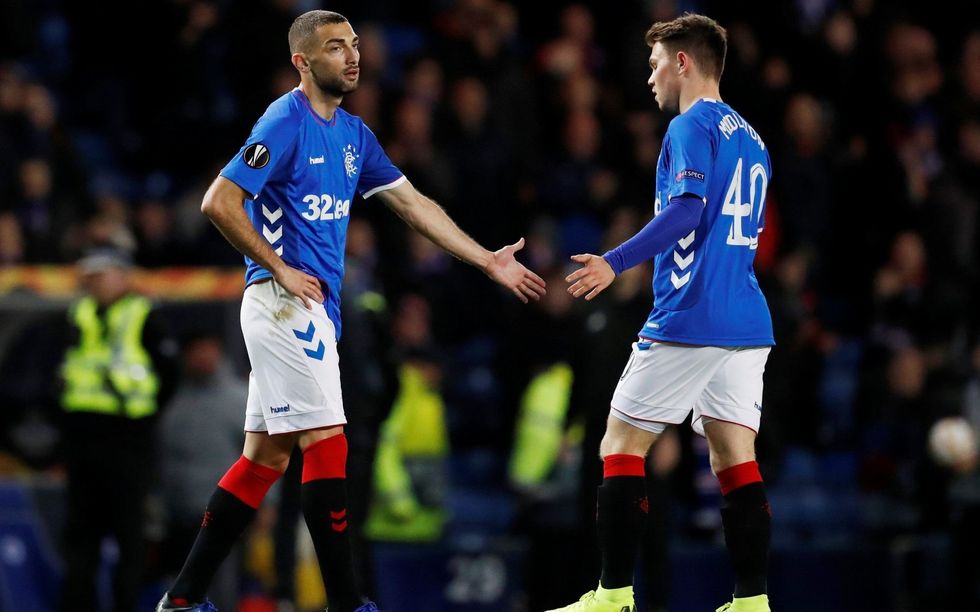 Rangers wingers Eros Grezda and Glenn Middleton react after the final whistle e1578319908474