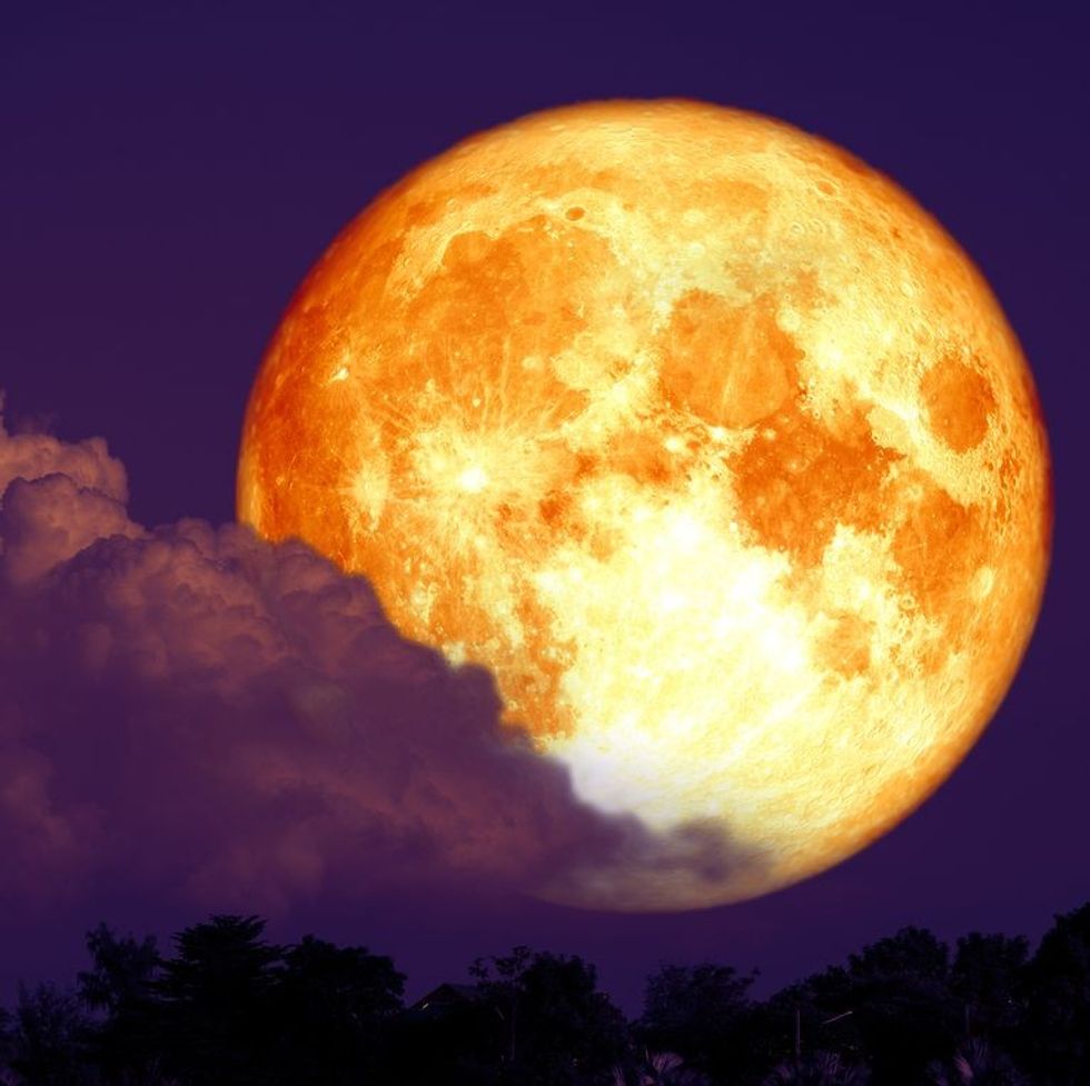 red sturgeon moon on the night red sky back royalty free image 1160044369 1564167323