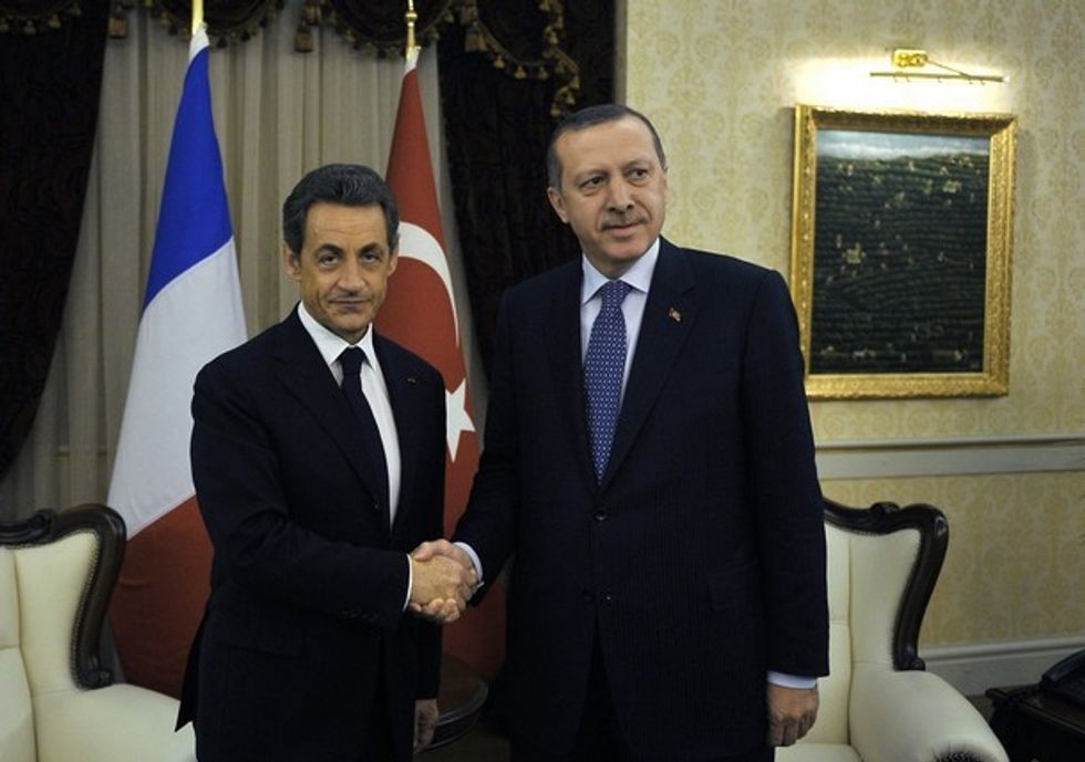 reuters 3 21 11 Nicolas Sarkozy Recep Tayyip Erdogan