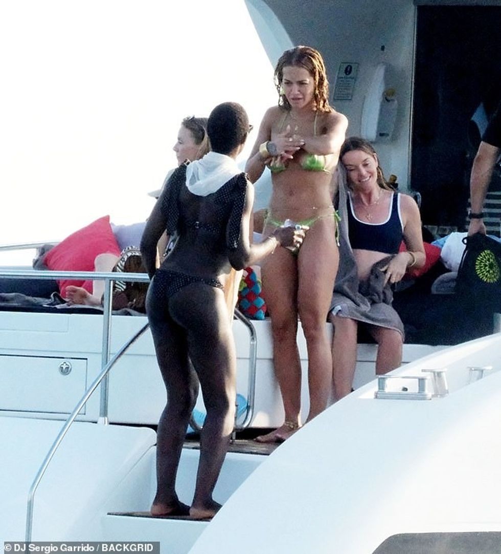 Rita chatted away to Anne Boleyn actress Jodie on the steps of the boat during the day out