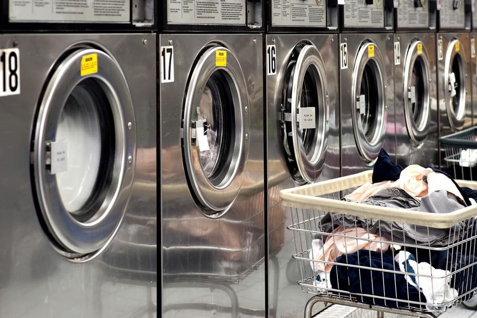 Row of Washing Machines in a Laundromat