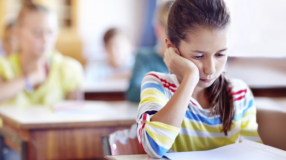 sad girl at school feature