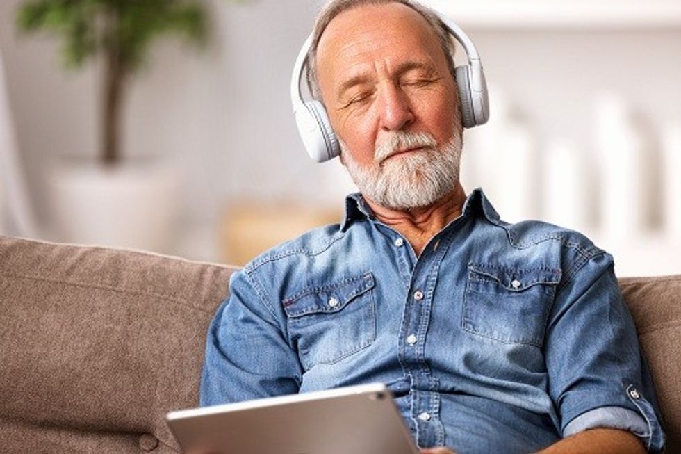 Senior Man Listening to Music