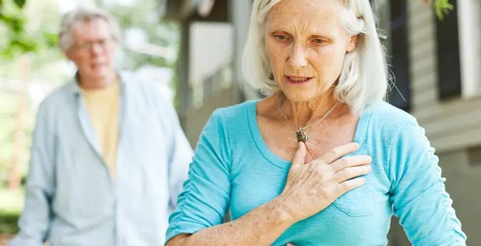 senior woman with chest pain. credit AHA
