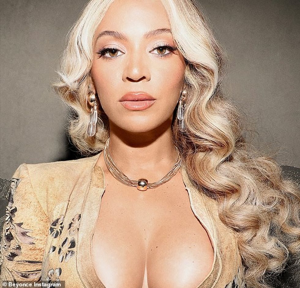 She looked ethereal with shimmering eyeshadow and a glossy lip