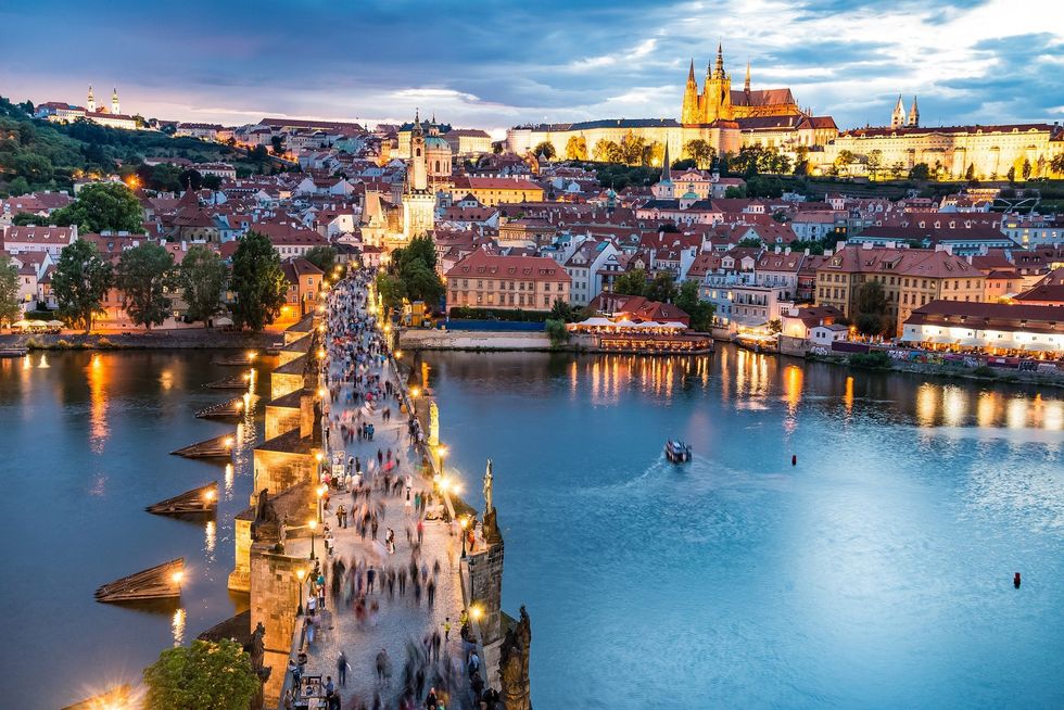 shutterstock 300856853 Prague with red roofs from above summer day at dusk Czech Republic