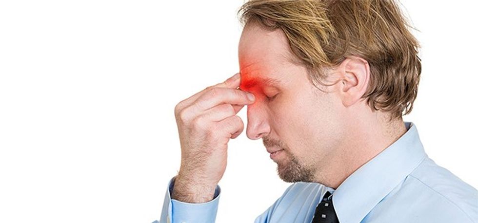 side profile young man having headache isolated on white