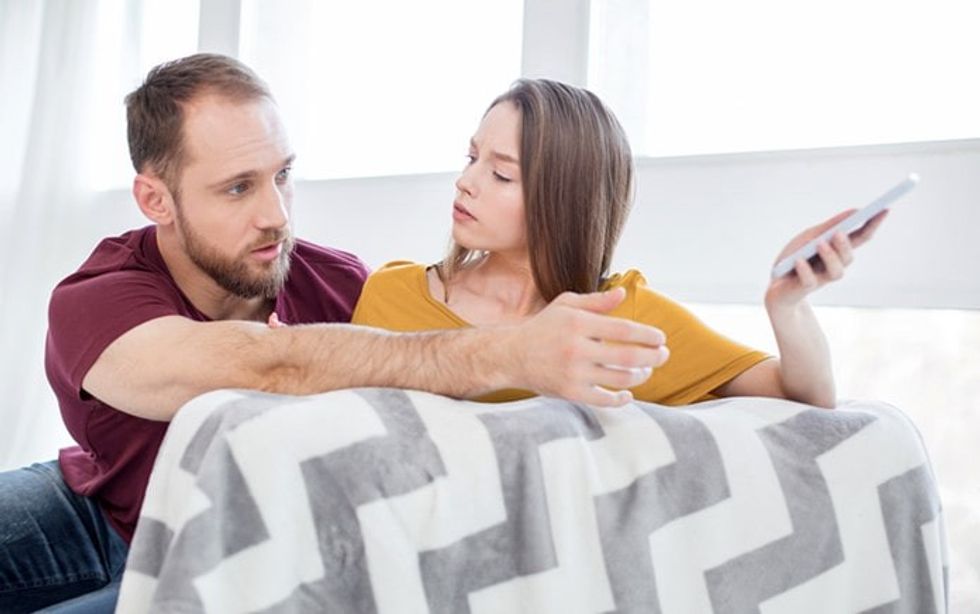 signs she is cheating