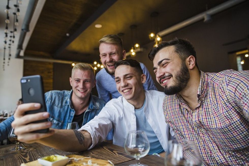 smiling male friends talking self portrait mobile restaurant 23 2147861921