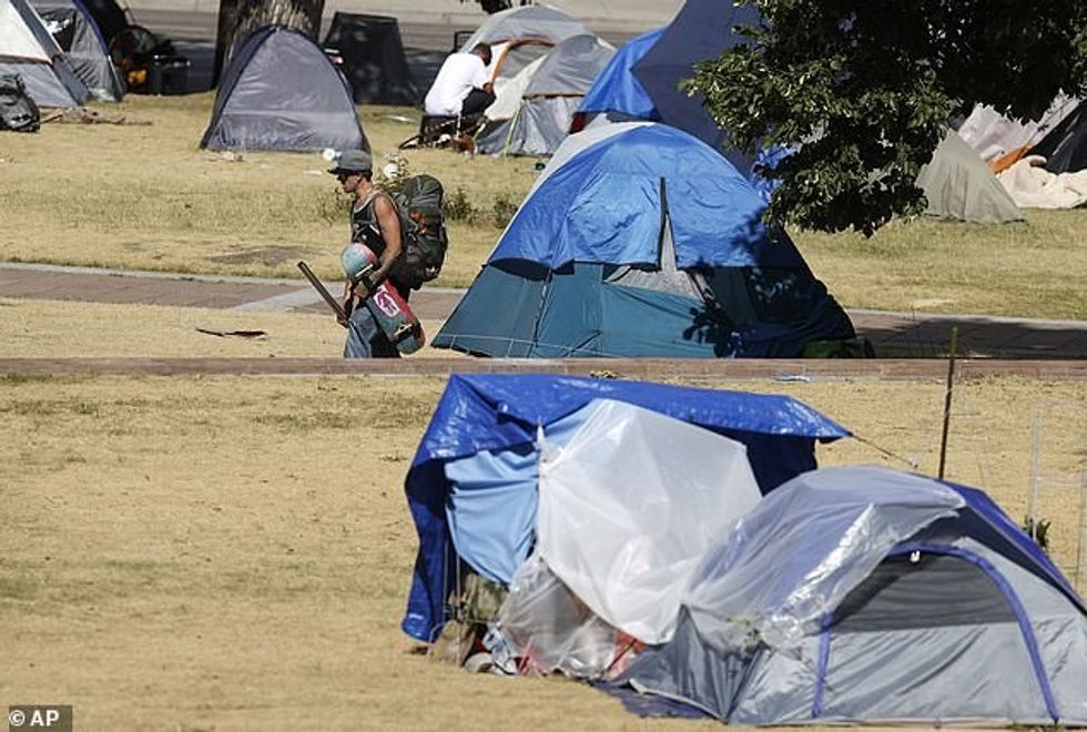 So far, health officials have detected four cases of trench fever among homeless people in Denver, with the last reported on Thursday. Tents pitched by homeless people are pictured in a park across from the State Capitol in Denver