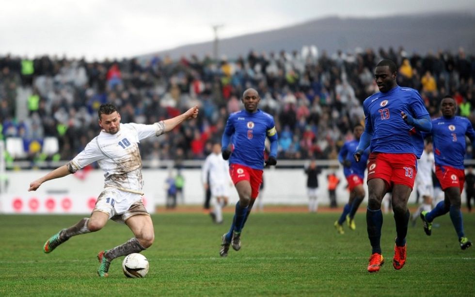 src.adapt .960.high .kosovo haiti 070114.1404230923457