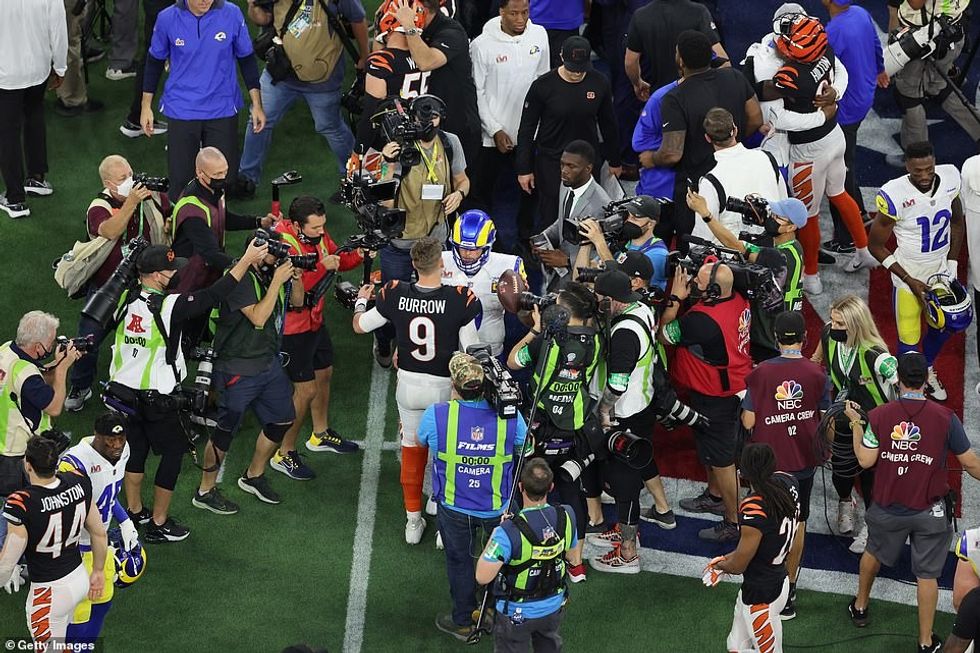 Star Cincinnati Bengals quarterback Joe Burrow shakes the hand of Rams counterpart Matthew Stafford after full-time
