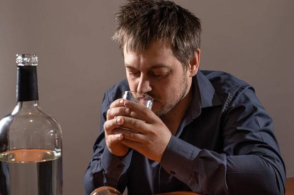 stock photo drunk man drinking alcohol alcoholism